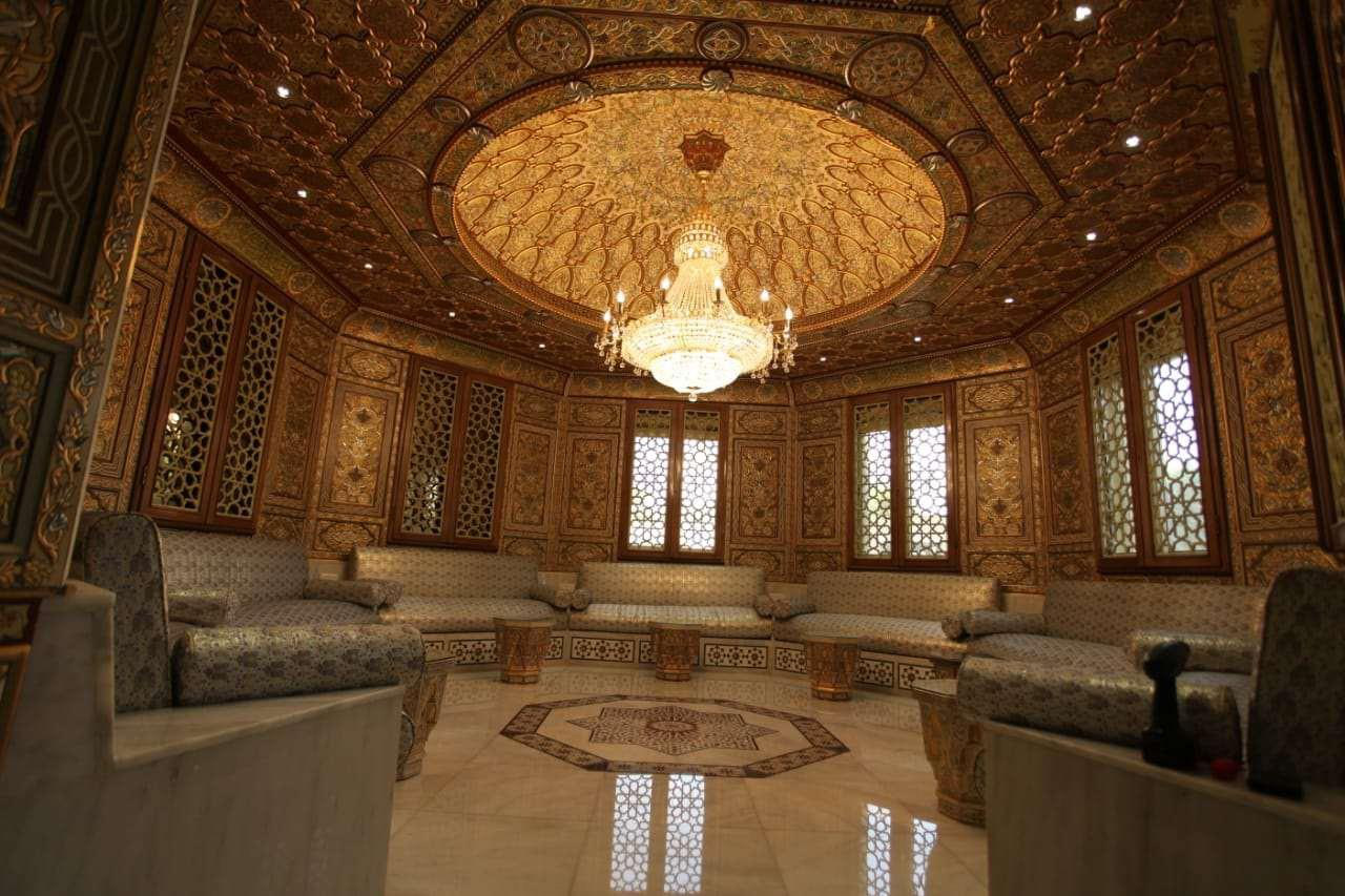 Ornamental majlis with golden dome ceiling